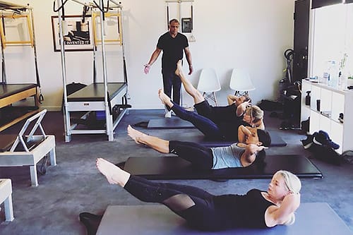 Pilates mat class taught in Santa Monica by Hector Mercado